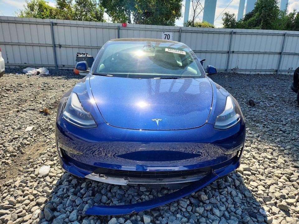 Photo 5 from auction – 2022 TESLA MODEL 3 with VIN 5YJ3E1EB5NF209113