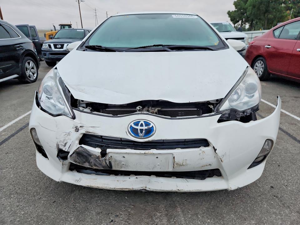 Zdjęcie 5 z aukcji – 2012 TOYOTA PRIUS C z VIN JTDKDTB39C1028061