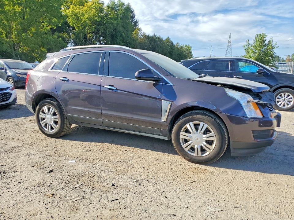 Снимка 4 от търг – 2015 CADILLAC SRX с VIN 3GYFNEE35FS565710