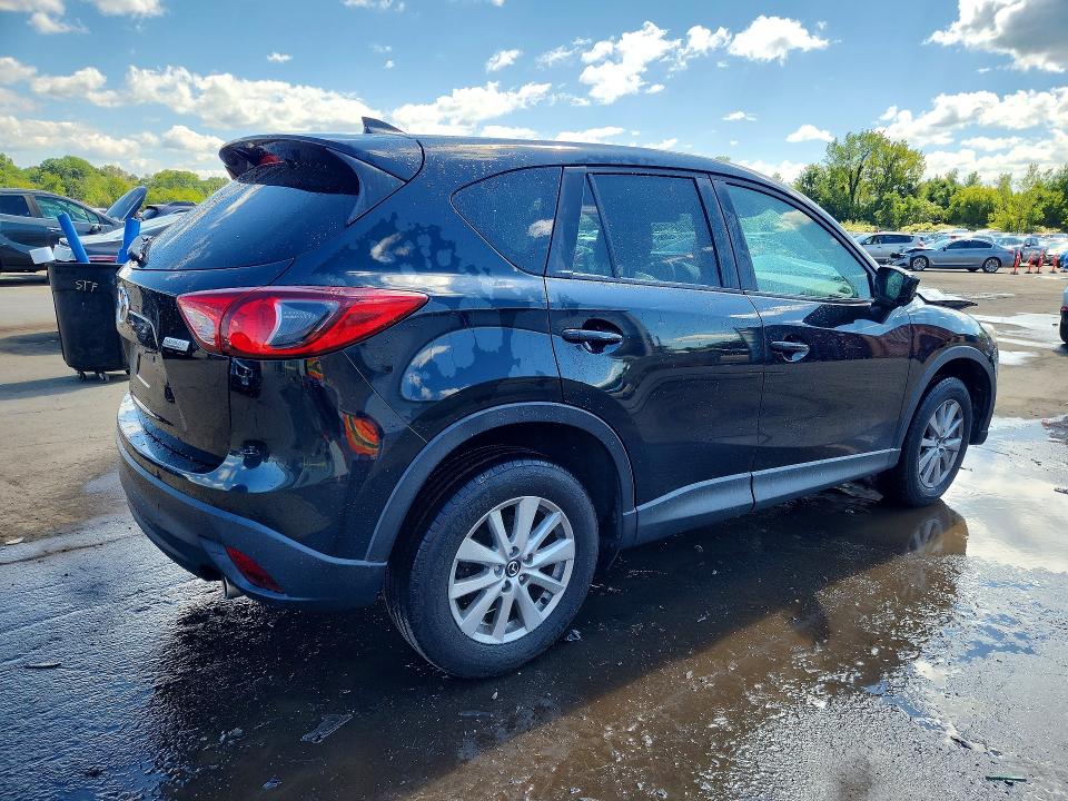 Photo 3 from auction – 2016 MAZDA CX-5 with VIN JM3KE4CY9G0781752
