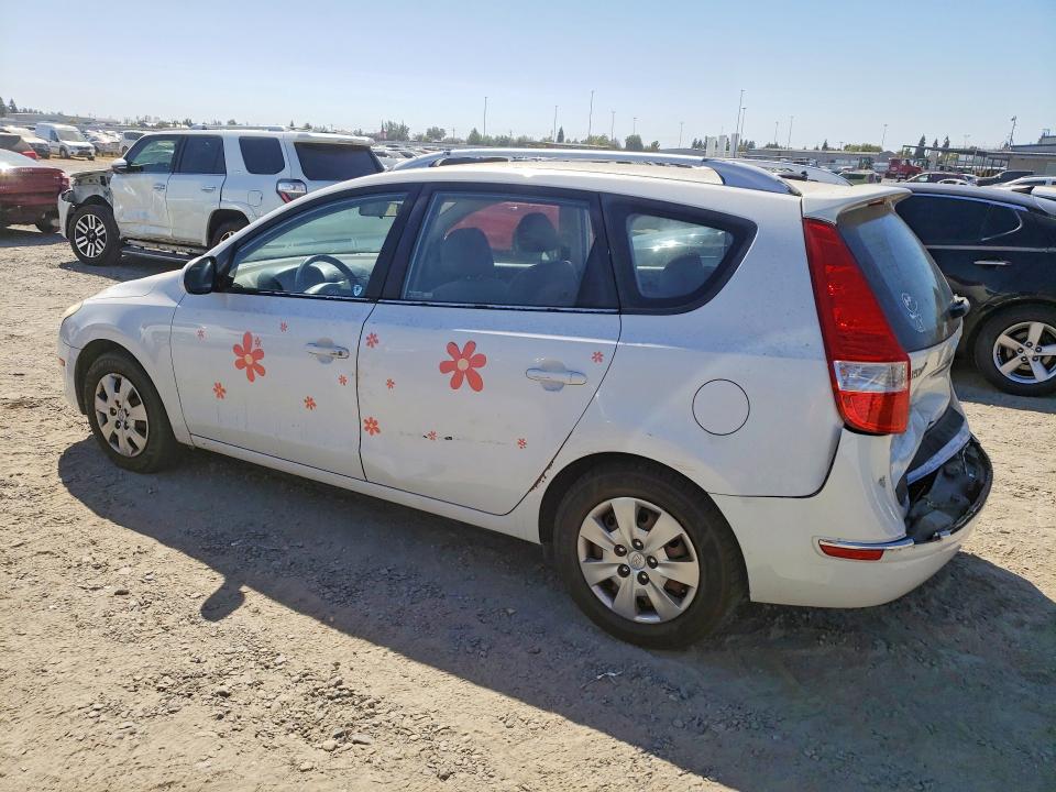 Photo 2 from auction – 2011 HYUNDAI ELANTRA TOURING with VIN KMHDC8AEXBU102298
