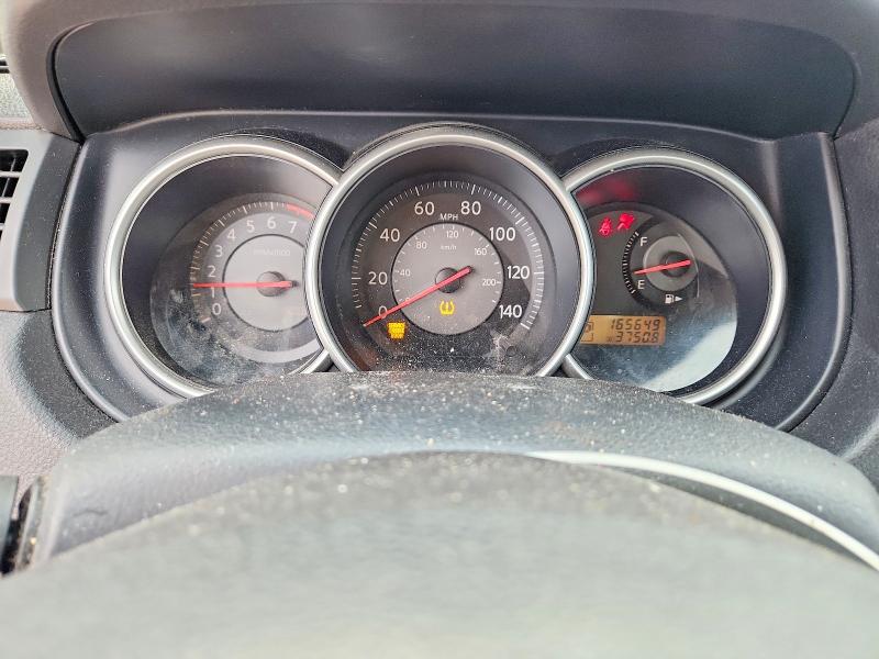 Photo 9 from auction – 2009 NISSAN VERSA with VIN 3N1CC11E89L492882