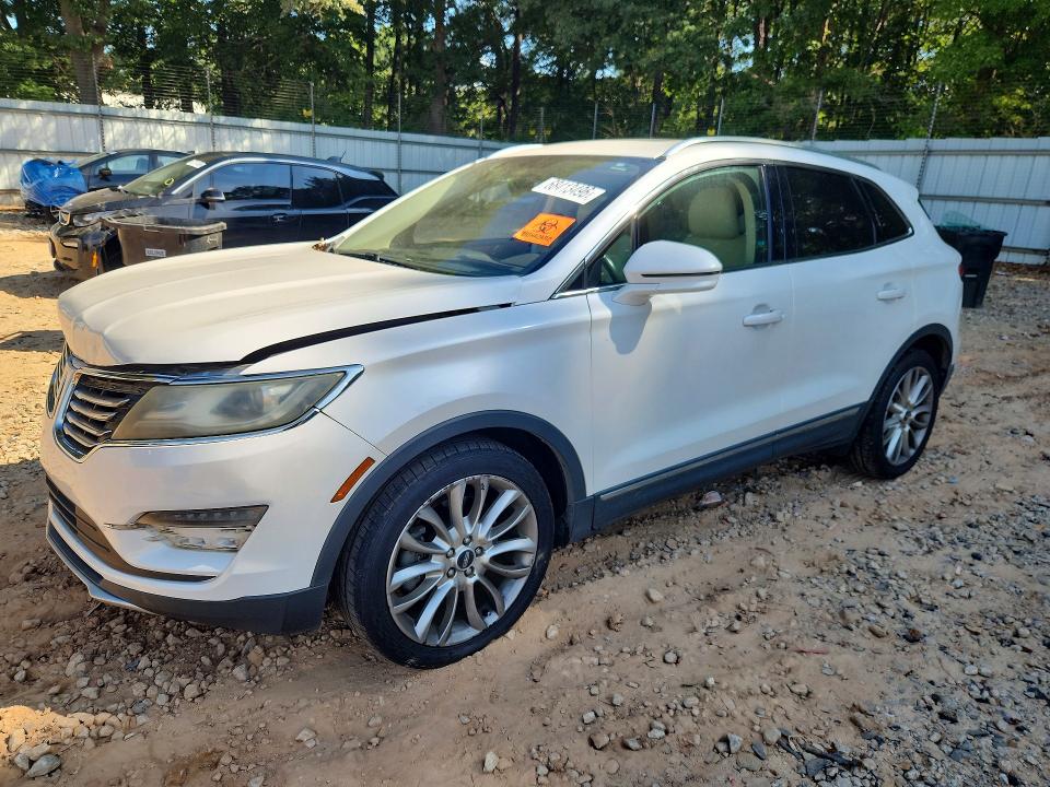 LINCOLN MKC 2015 with VIN 5LMCJ1A94FUJ26000 - Photo from auction