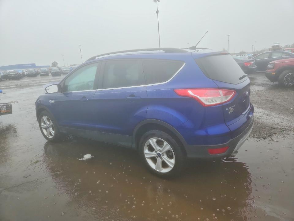 Photo 2 from auction – 2016 FORD ESCAPE with VIN 1FMCU9GX7GUB13693