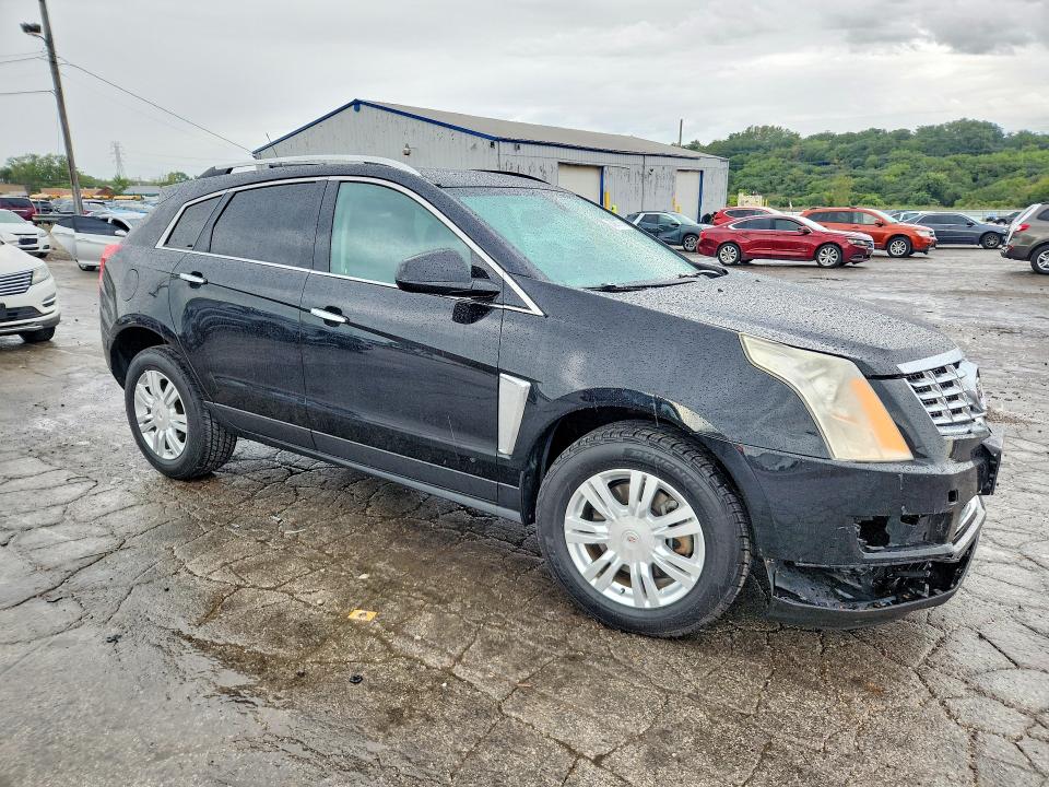 Photo 4 from auction – 2014 CADILLAC SRX with VIN 3GYFNAE37ES588218