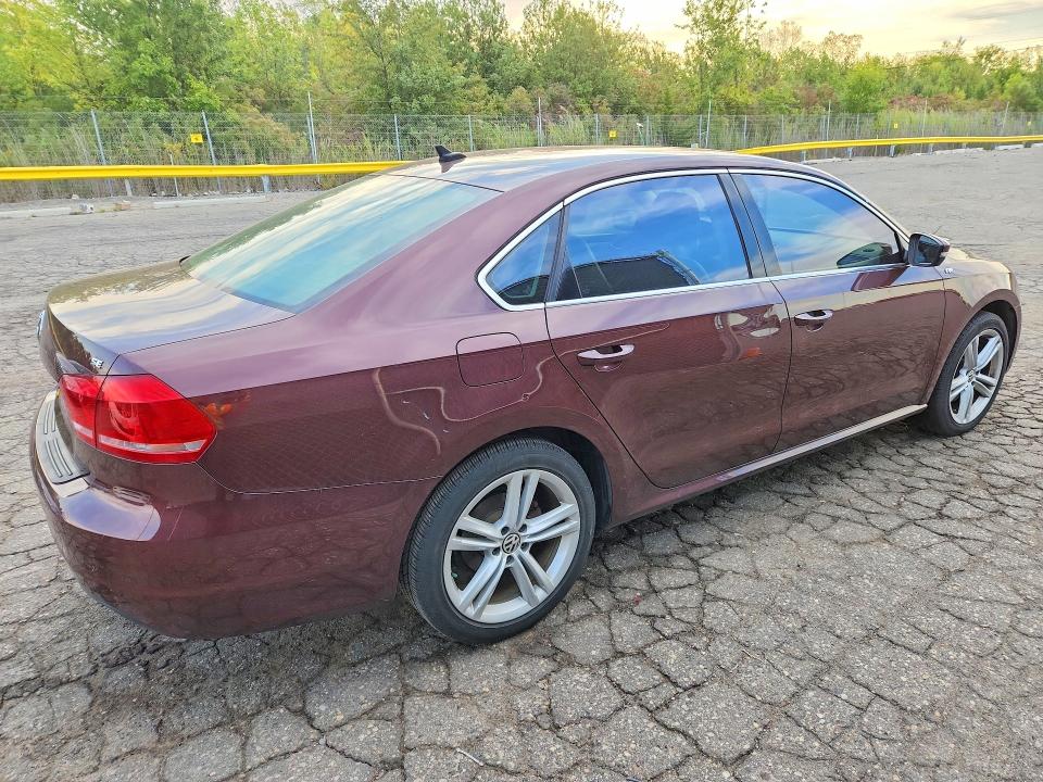 Photo 3 from auction – 2014 VOLKSWAGEN PASSAT with VIN 1VWBN7A34EC023361