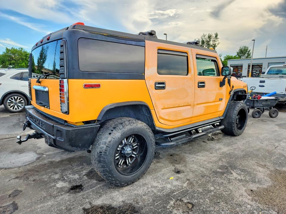 Фото 3 с аукциона – 2003 HUMMER H2 с VIN 5GRGN23U03H136966