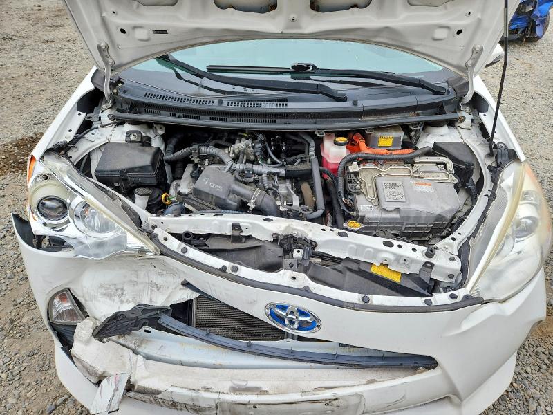 Photo 11 from auction – 2014 TOYOTA PRIUS C with VIN JTDKDTB30E1063252