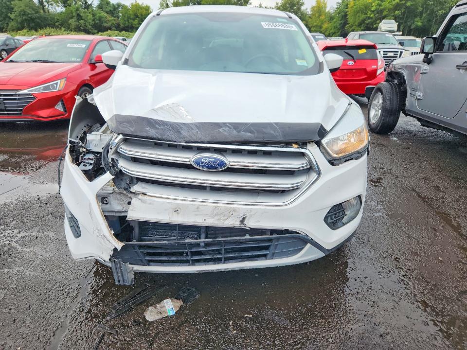 Photo 5 from auction – 2017 FORD ESCAPE with VIN 1FMCU9GD1HUB19044