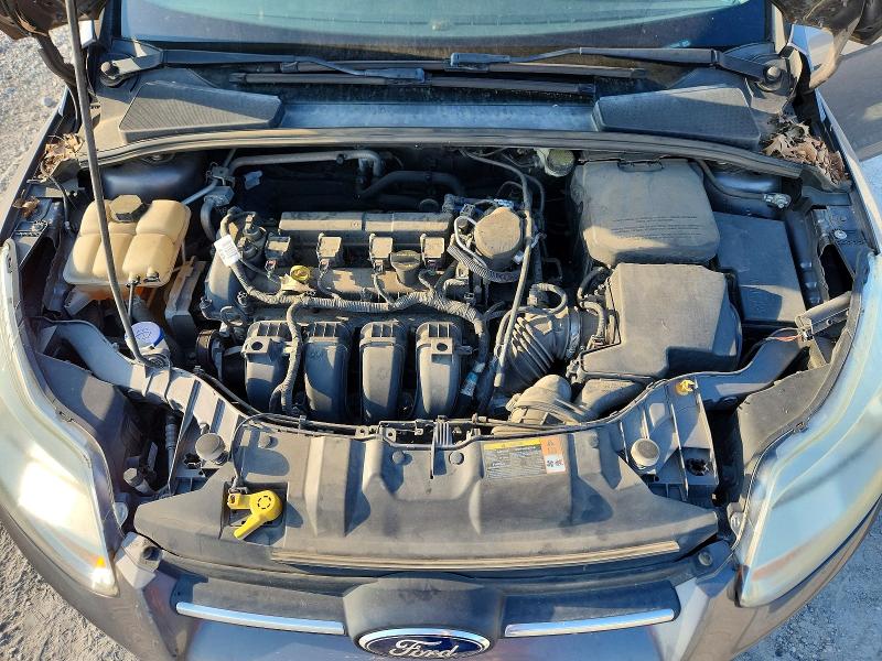Photo 11 from auction – 2014 FORD FOCUS with VIN 1FADP3F23EL233468