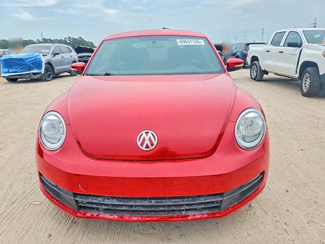 Photo 5 from auction – 2014 VOLKSWAGEN BEETLE with VIN 3VWJ07AT9EM640229