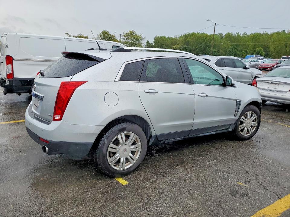 Снимка 3 от търг – 2014 CADILLAC SRX с VIN 3GYFNEE36ES581445