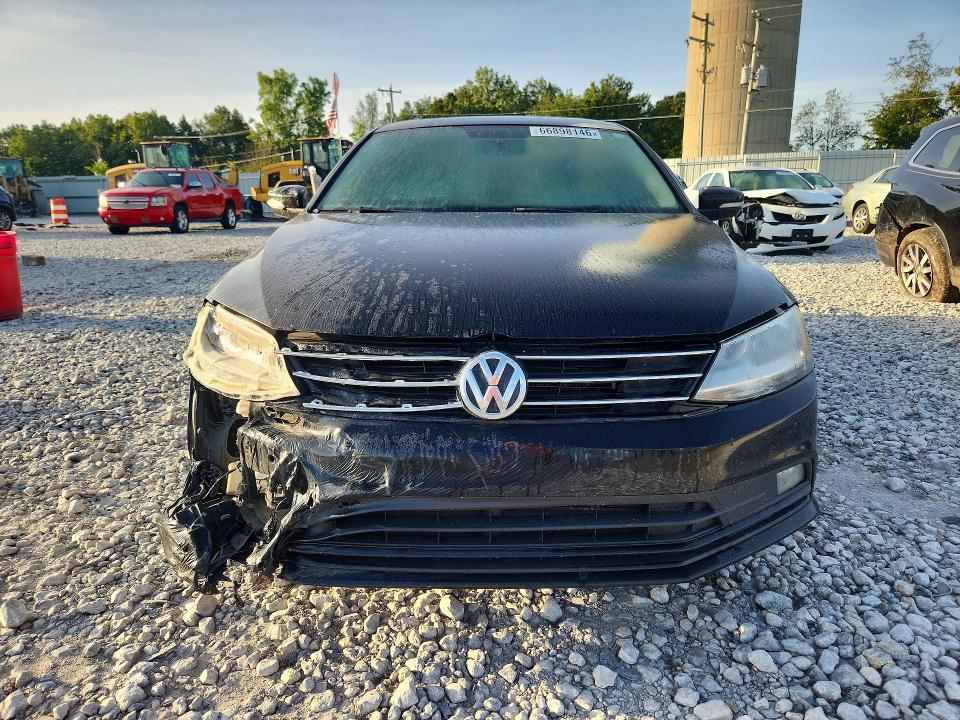 Photo 5 from auction – 2015 VOLKSWAGEN JETTA with VIN 3VWD17AJ6FM355823