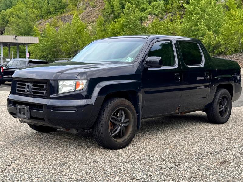 Photo 2 from auction – 2006 HONDA RIDGELINE with VIN 2HJYK16596H555521