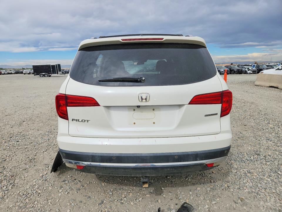 Photo 6 from auction – 2018 HONDA PILOT with VIN 5FNYF5H99JB017691