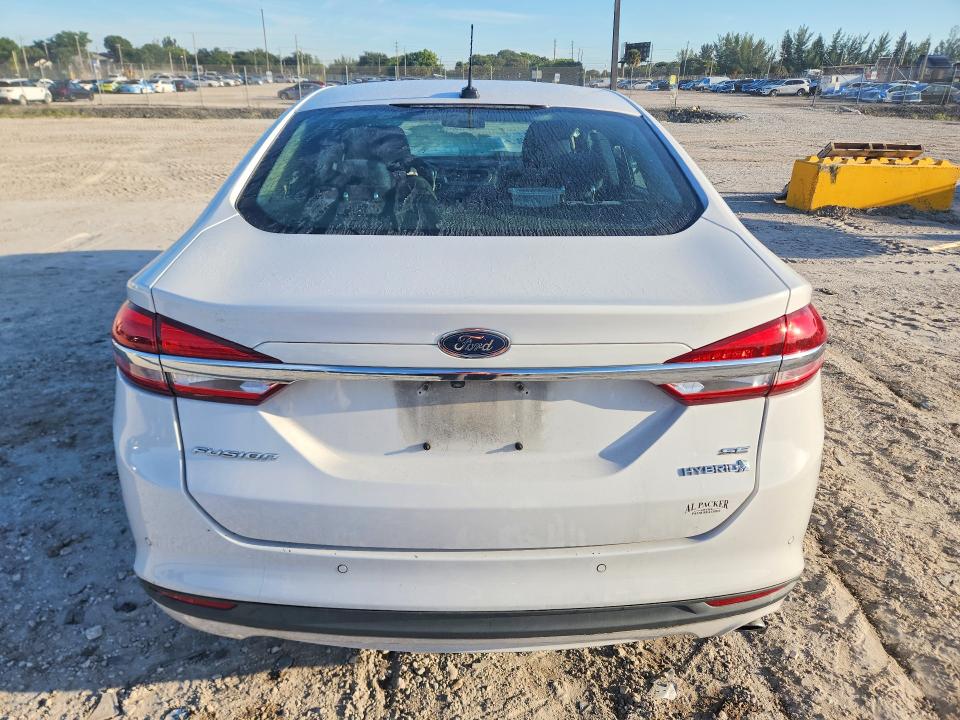 Foto 6 de la subasta – 2018 FORD FUSION con VIN 3FA6P0LU3JR238341
