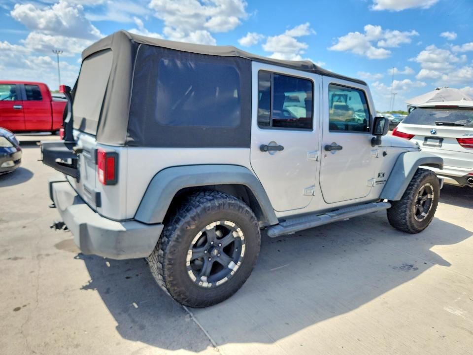 Photo 3 from auction – 2009 JEEP WRANGLER UNLIMITED with VIN 1J4GB39129L742847