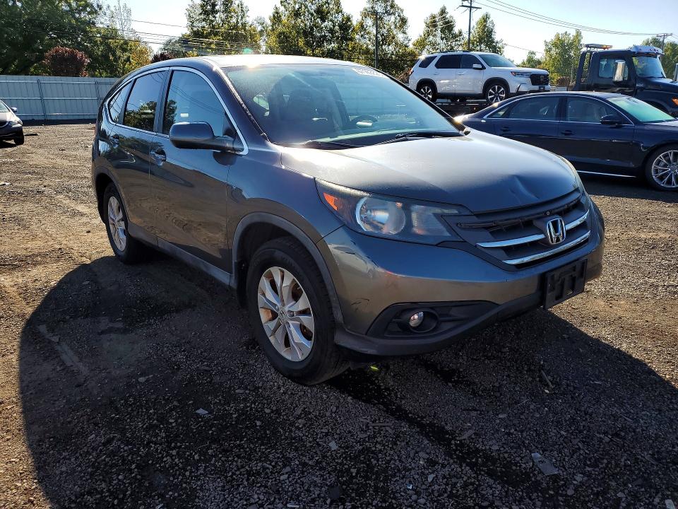 Photo 4 from auction – 2013 HONDA CR-V with VIN 2HKRM4H52DH601356