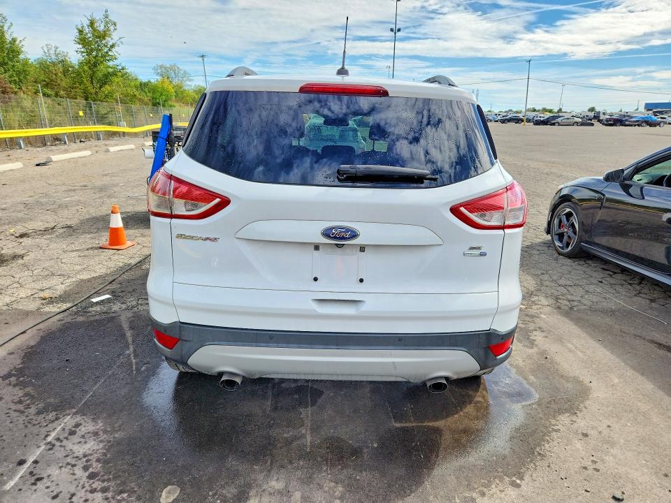 Photo 6 from auction – 2016 FORD ESCAPE with VIN 1FMCU9GX6GUC17060