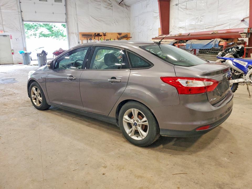Снимка 2 от търг – 2014 FORD FOCUS с VIN 1FADP3F21EL366326