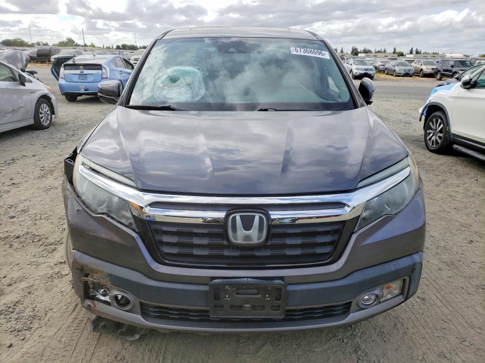 Фото 5 с аукциона – 2018 HONDA RIDGELINE с VIN 5FPYK3F77JB012398