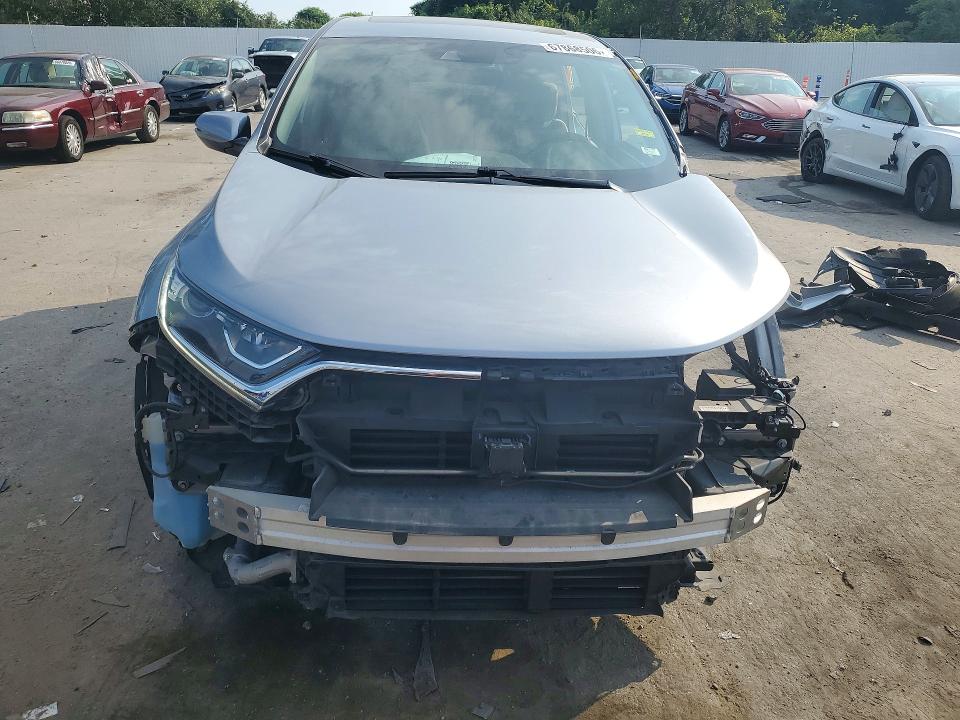 Photo 5 from auction – 2018 HONDA CR-V with VIN 7FARW2H52JE077249