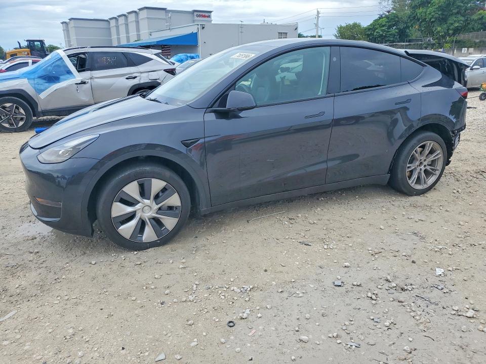 TESLA MODEL Y 2024 с VIN 7SAYGDED3RF005048 - Снимка от търг