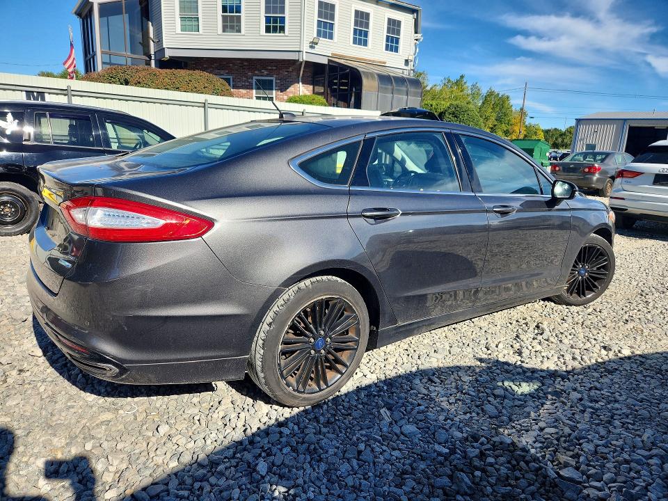 Photo 3 from auction – 2016 FORD FUSION with VIN 3FA6P0T94GR313679