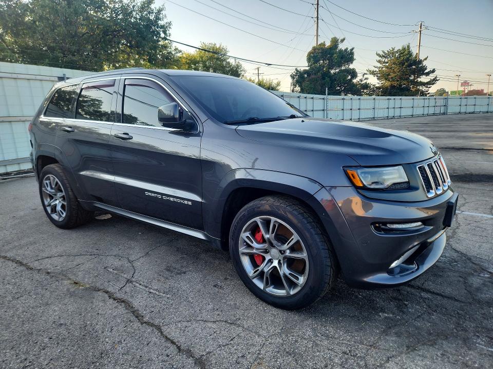 Photo 4 from auction – 2015 JEEP GRAND CHEROKEE with VIN 1C4RJFDJ7FC778507