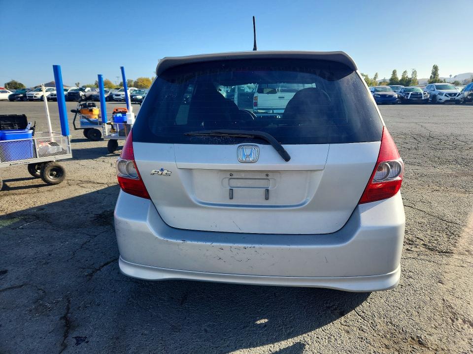 Photo 6 from auction – 2007 HONDA FIT with VIN JHMGD38697S004039