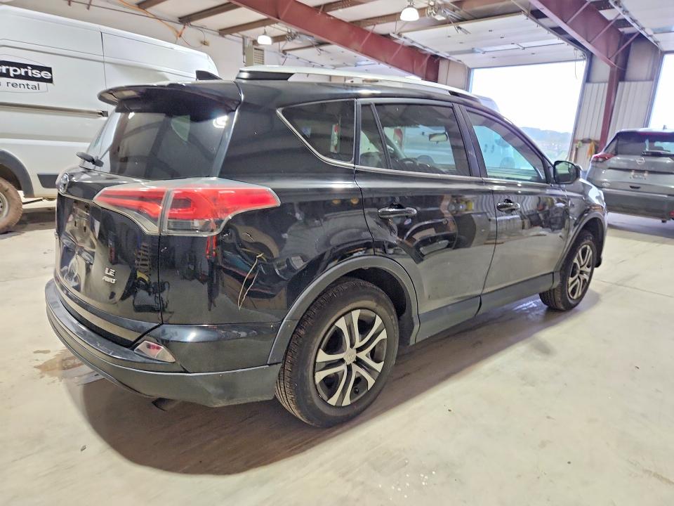 Снимка 3 от търг – 2016 TOYOTA RAV4 с VIN 2T3BFREV8GW511574
