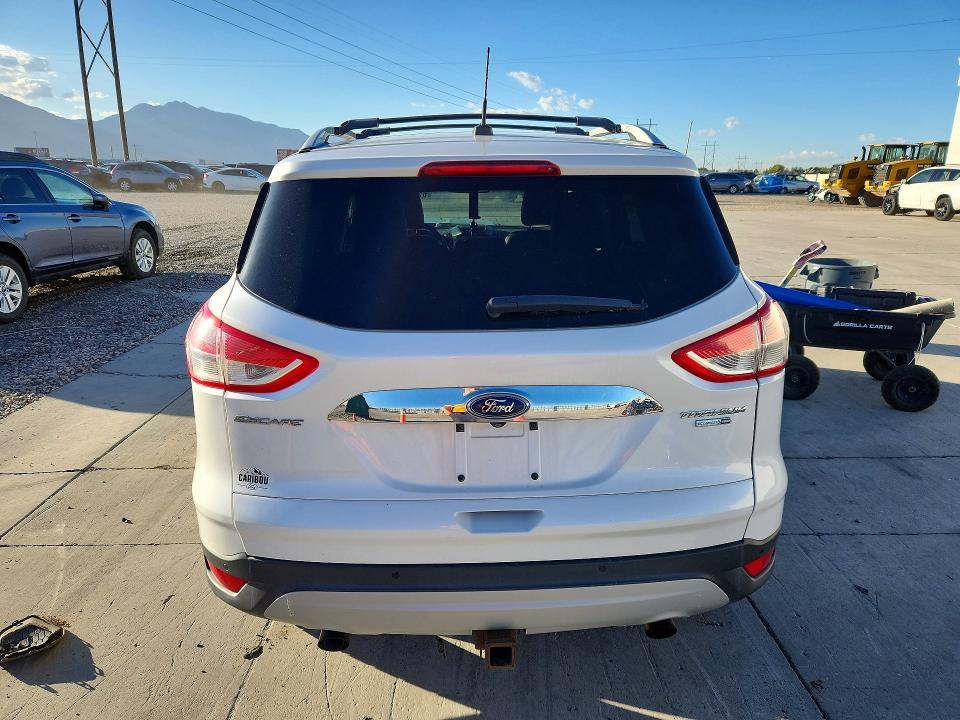 Foto 6 de la subasta – 2014 FORD ESCAPE con VIN 1FMCU9J90EUE52772