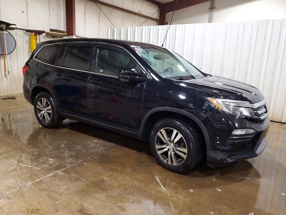 Снимка 4 от търг – 2016 HONDA PILOT с VIN 5FNYF6H82GB010636