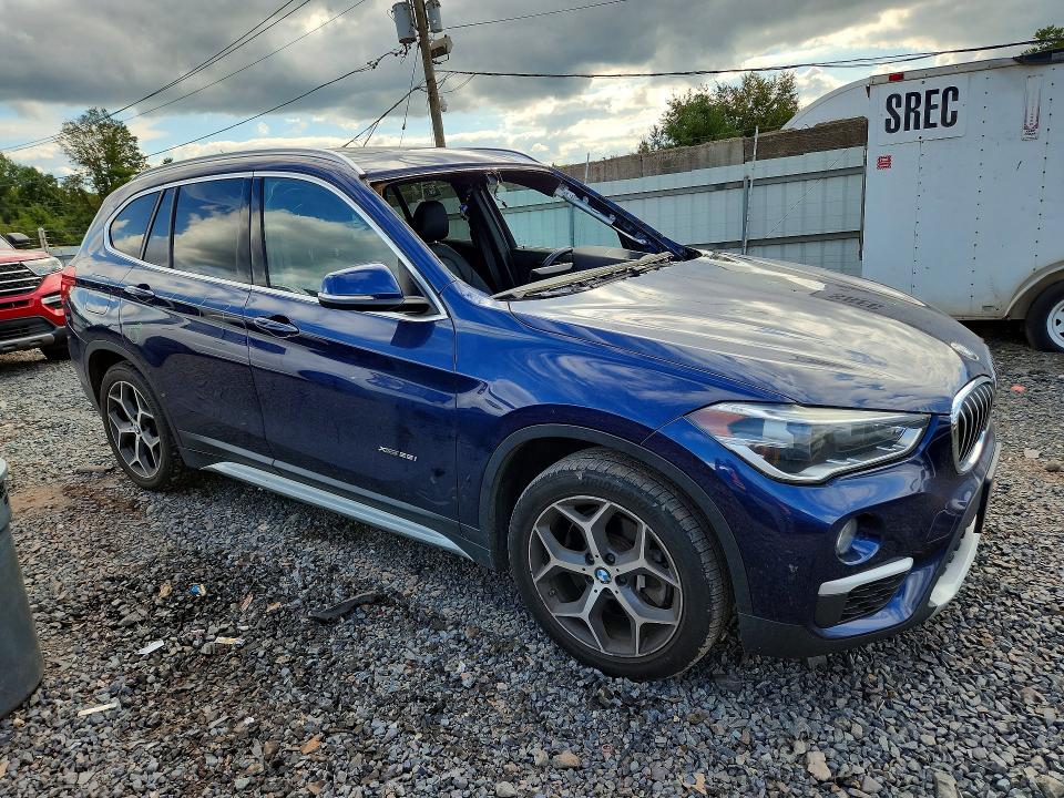 Фото 4 с аукциона – 2016 BMW X1 с VIN WBXHT3C37GP880720