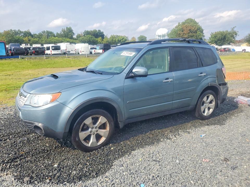 SUBARU FORESTER 2011 with VIN JF2SHGAC8BH750092 - Photo from auction