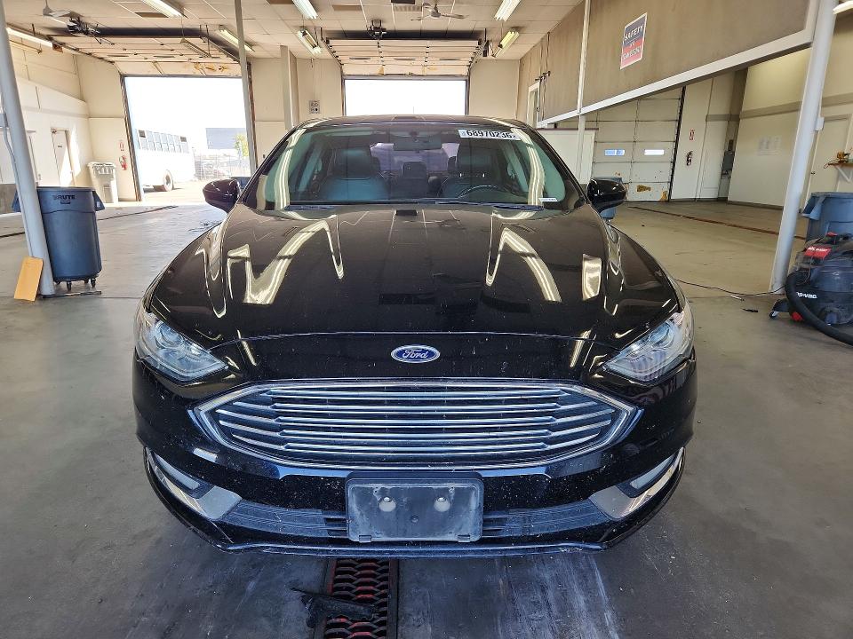 Photo 5 from auction – 2018 FORD FUSION with VIN 3FA6P0LU9JR116339