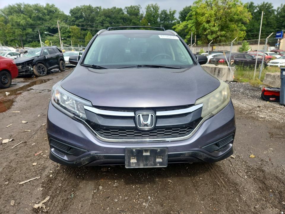 Photo 5 from auction – 2016 HONDA CR-V with VIN 5J6RM4H49GL060033