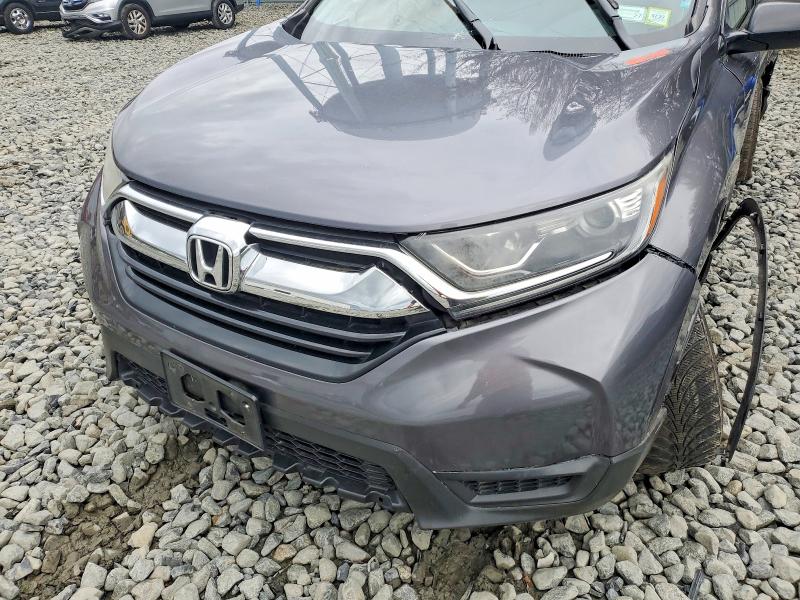 Photo 11 from auction – 2018 HONDA CR-V with VIN 2HKRW6H34JH210984