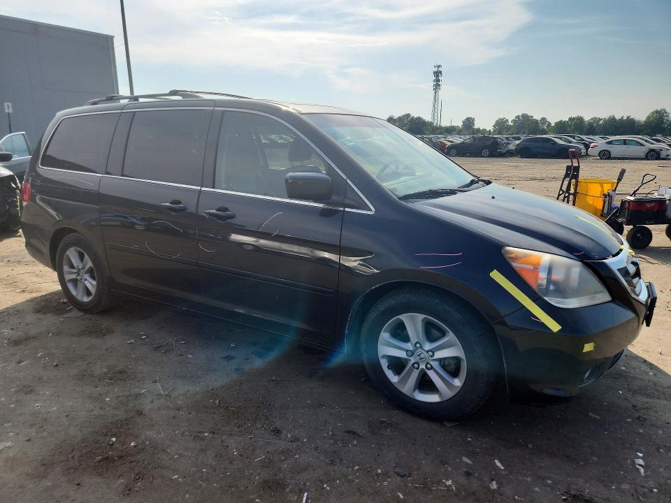 Photo 4 from auction – 2010 HONDA ODYSSEY with VIN 5FNRL3H94AB091120