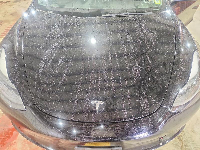 Снимка 11 от търг – 2022 TESLA MODEL 3 с VIN 5YJ3E1EB8NF120510