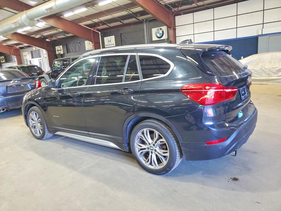 Photo 2 from auction – 2017 BMW X1 with VIN WBXHT3C39H5F67765