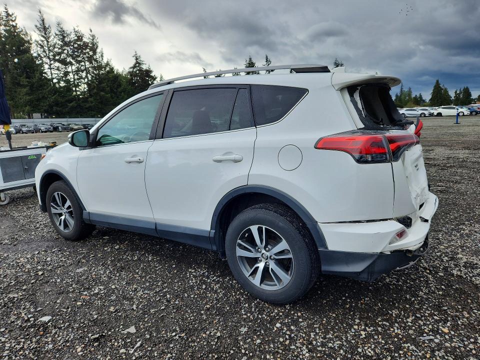 Photo 2 from auction – 2018 TOYOTA RAV4 with VIN 2T3RFREV3JW801050