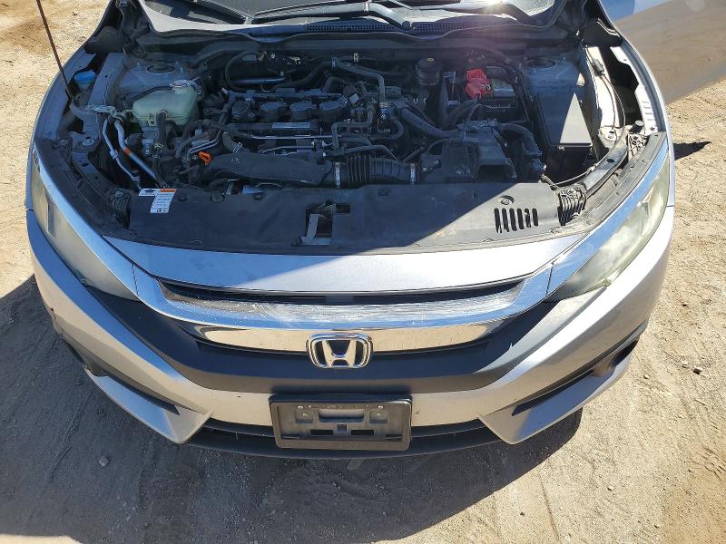 Photo 11 from auction – 2018 HONDA CIVIC with VIN 2HGFC3B30JH354044