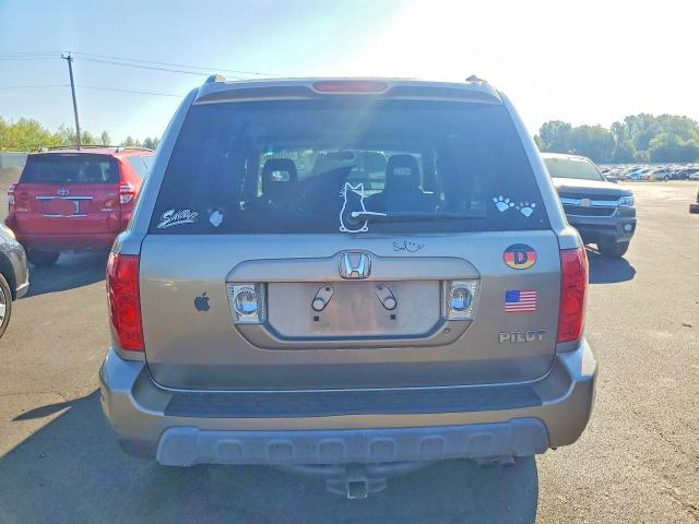 Фото 6 с аукциона – 2004 HONDA PILOT с VIN 2HKYF18704H500774
