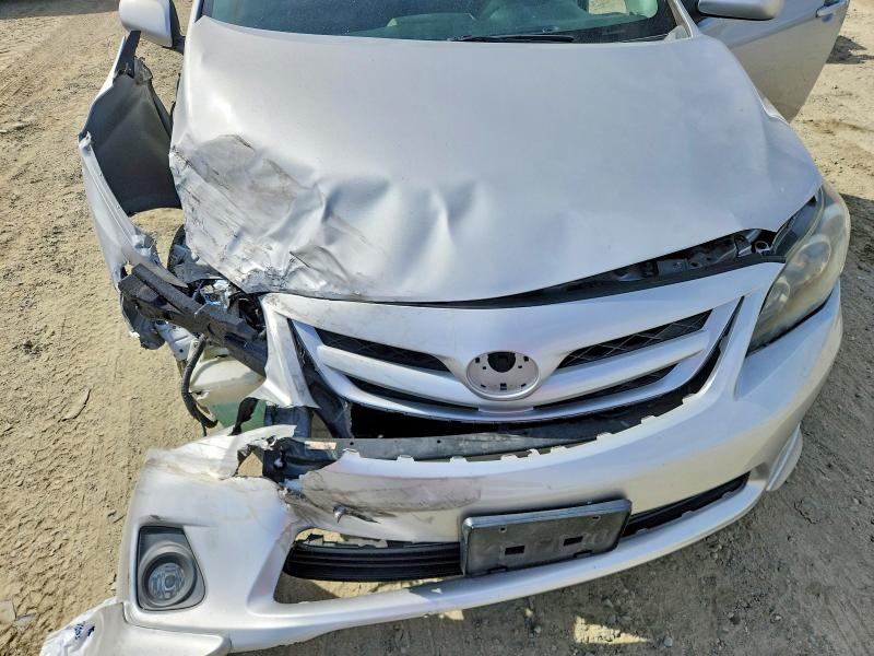 Photo 11 from auction – 2011 TOYOTA COROLLA with VIN 2T1BU4EE4BC688957