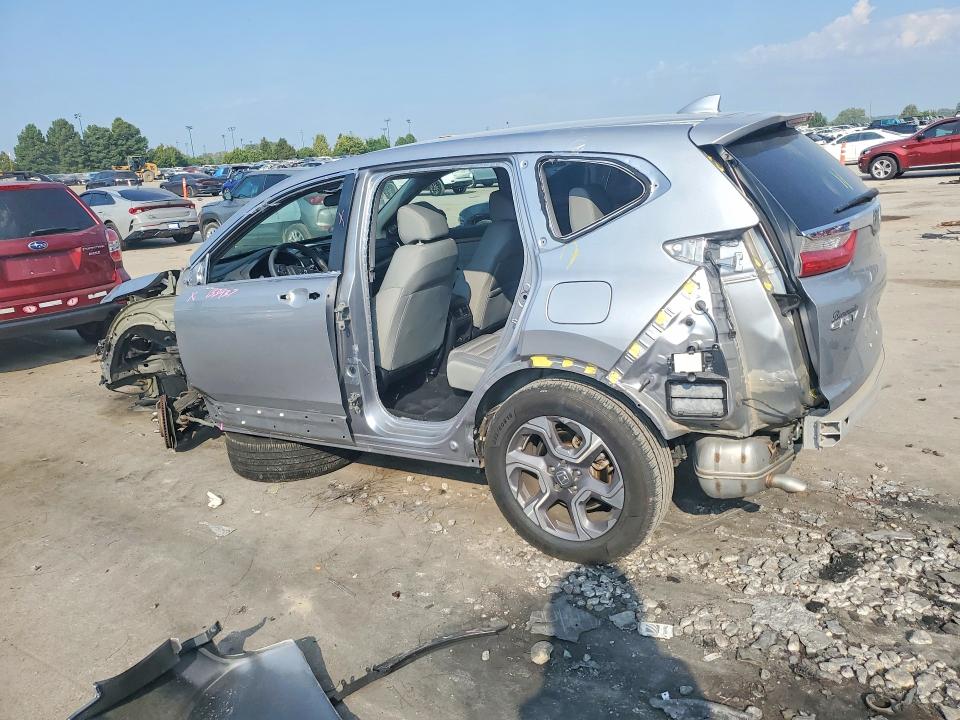 Photo 2 from auction – 2018 HONDA CR-V with VIN 7FARW2H52JE077249