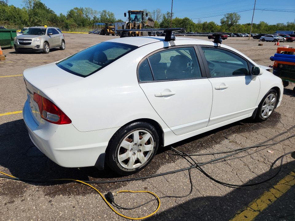 Photo 3 from auction – 2011 HONDA CIVIC with VIN 19XFA1F55BE014339