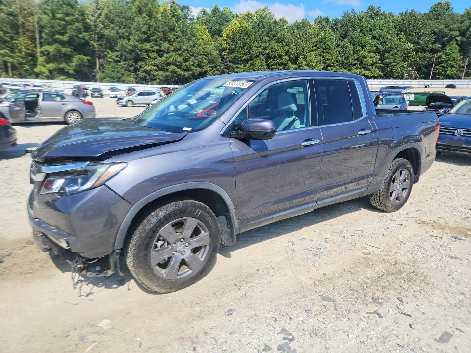 HONDA RIDGELINE 2020 with VIN 5FPYK3F71LB021696 - Photo from auction