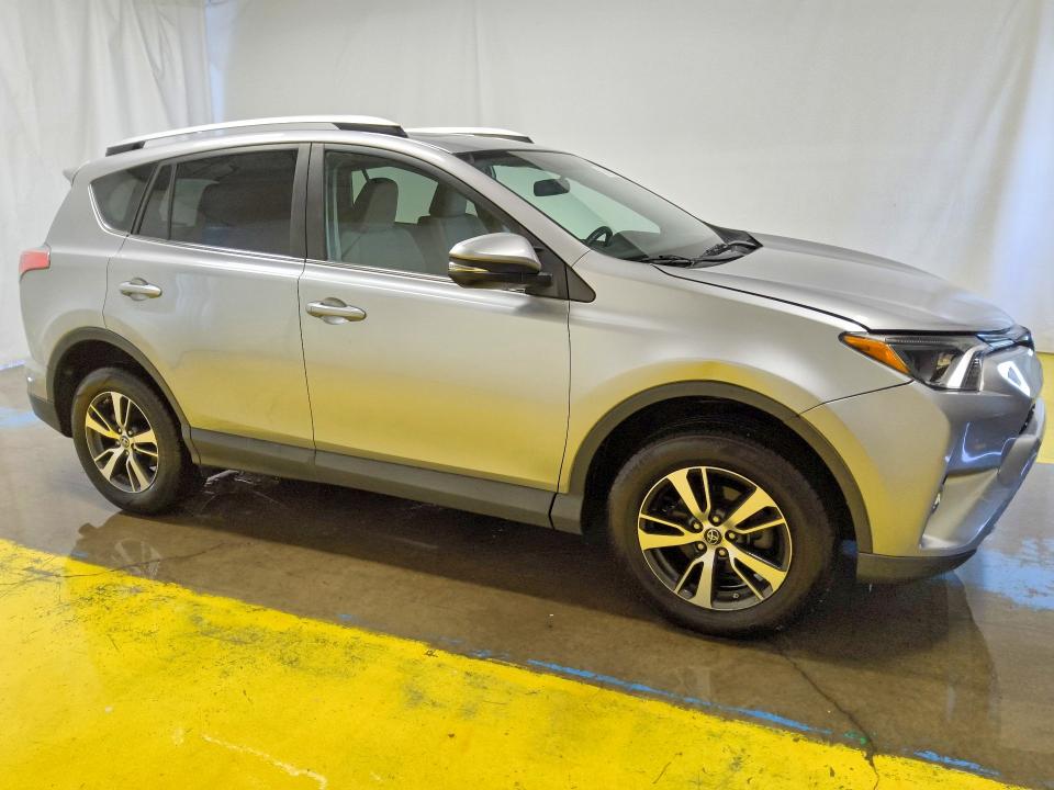 Photo 4 from auction – 2016 TOYOTA RAV4 with VIN 2T3RFREVXGW420689