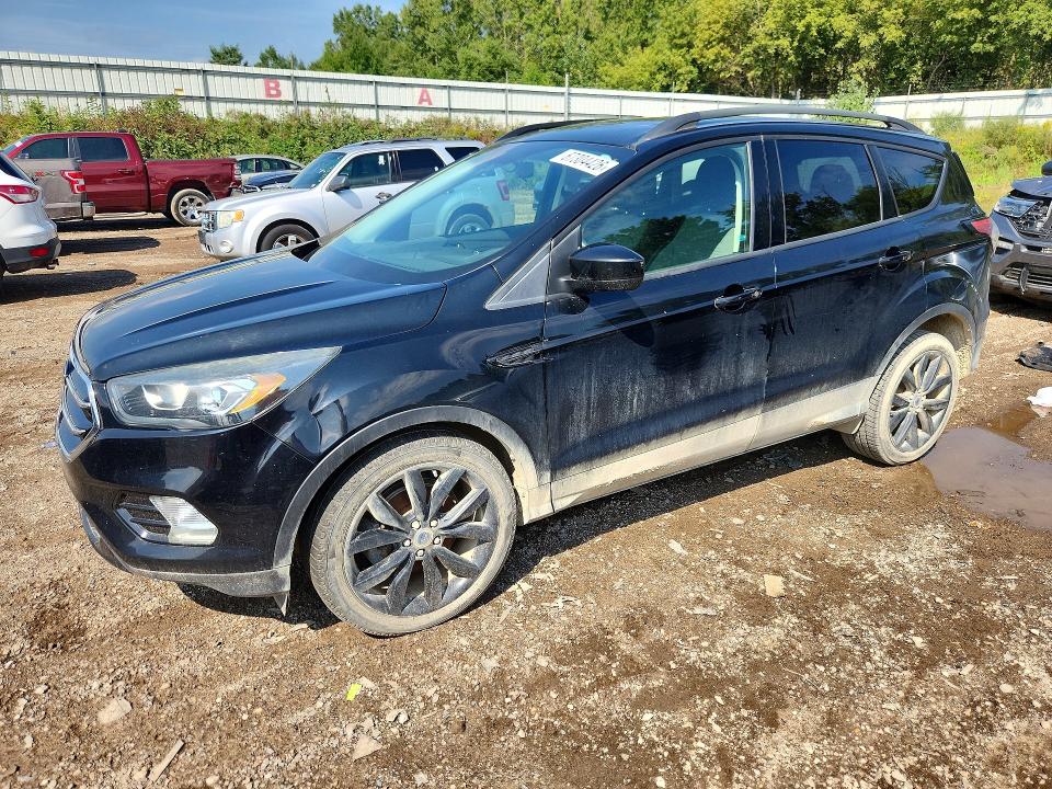 FORD ESCAPE 2017 with VIN 1FMCU0GD3HUC33140 - Photo from auction